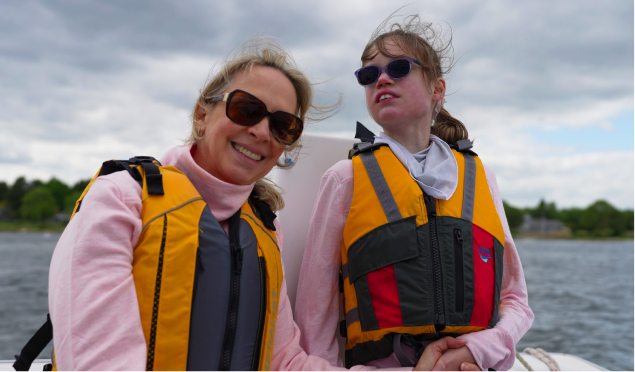 Ruby and her dad skiing