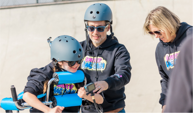Ruby and her dad skiing