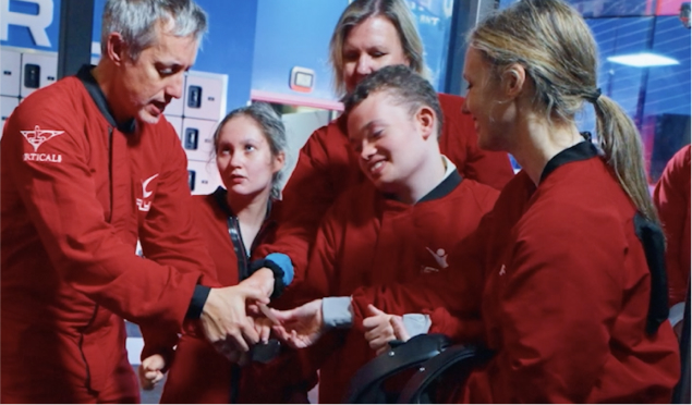 Ruby and her dad skiing